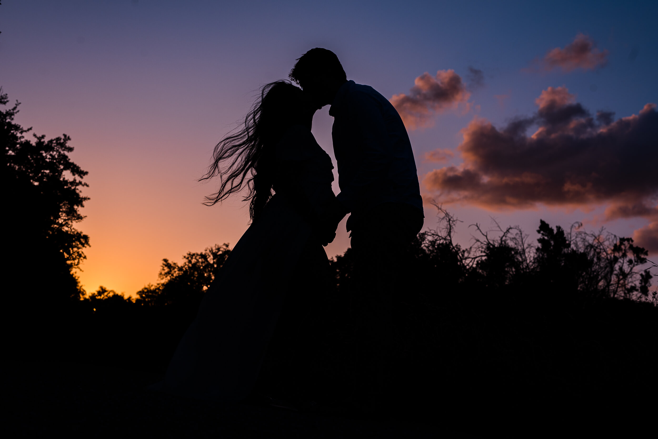 maternity photos with couple silhouette at purgatory creek trail in san marcos texas