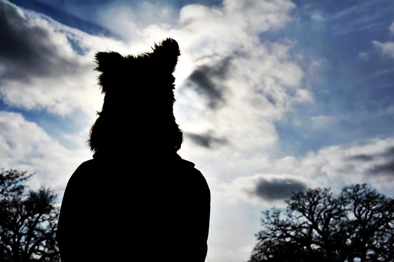 silhouette after winter storm of teenager