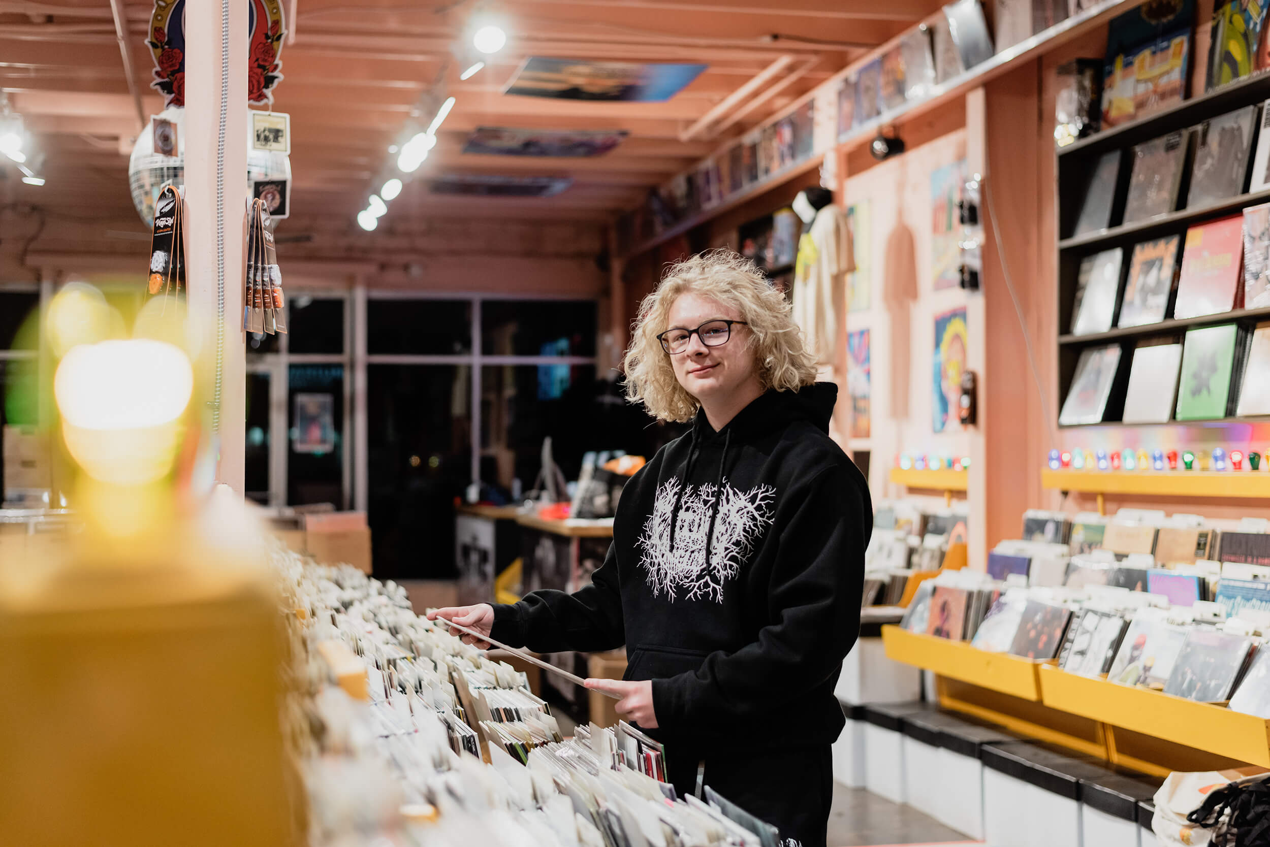 senior boy photos in dallas texas at a record store