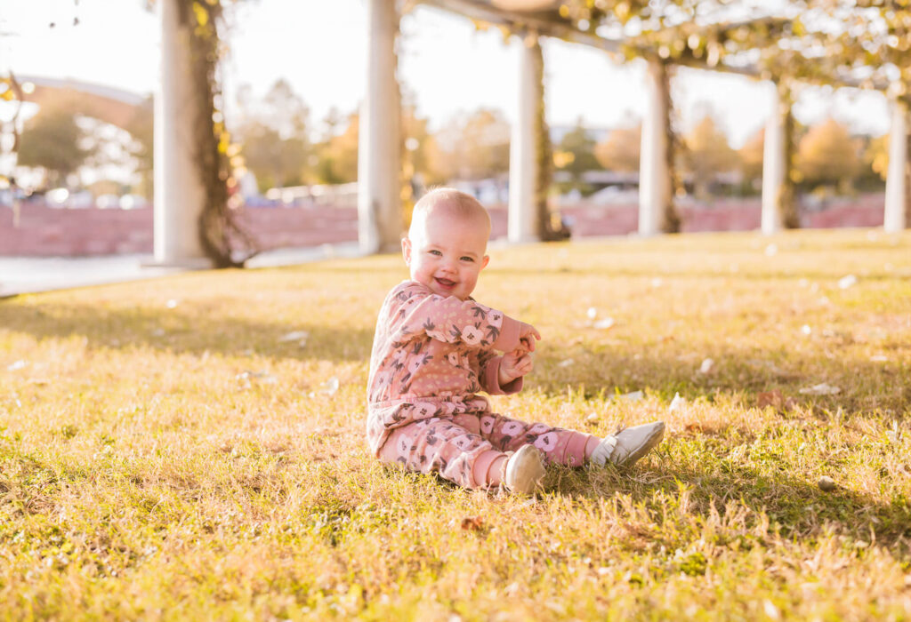 baby smiling at mueller lake park in austin texas