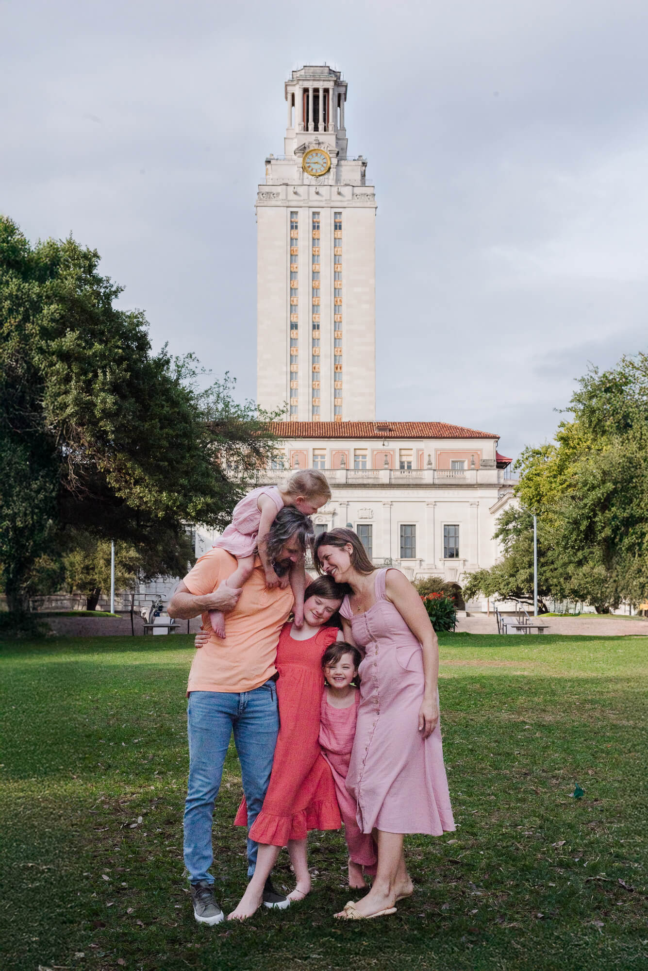 family portrait with the university of texas tower in the background