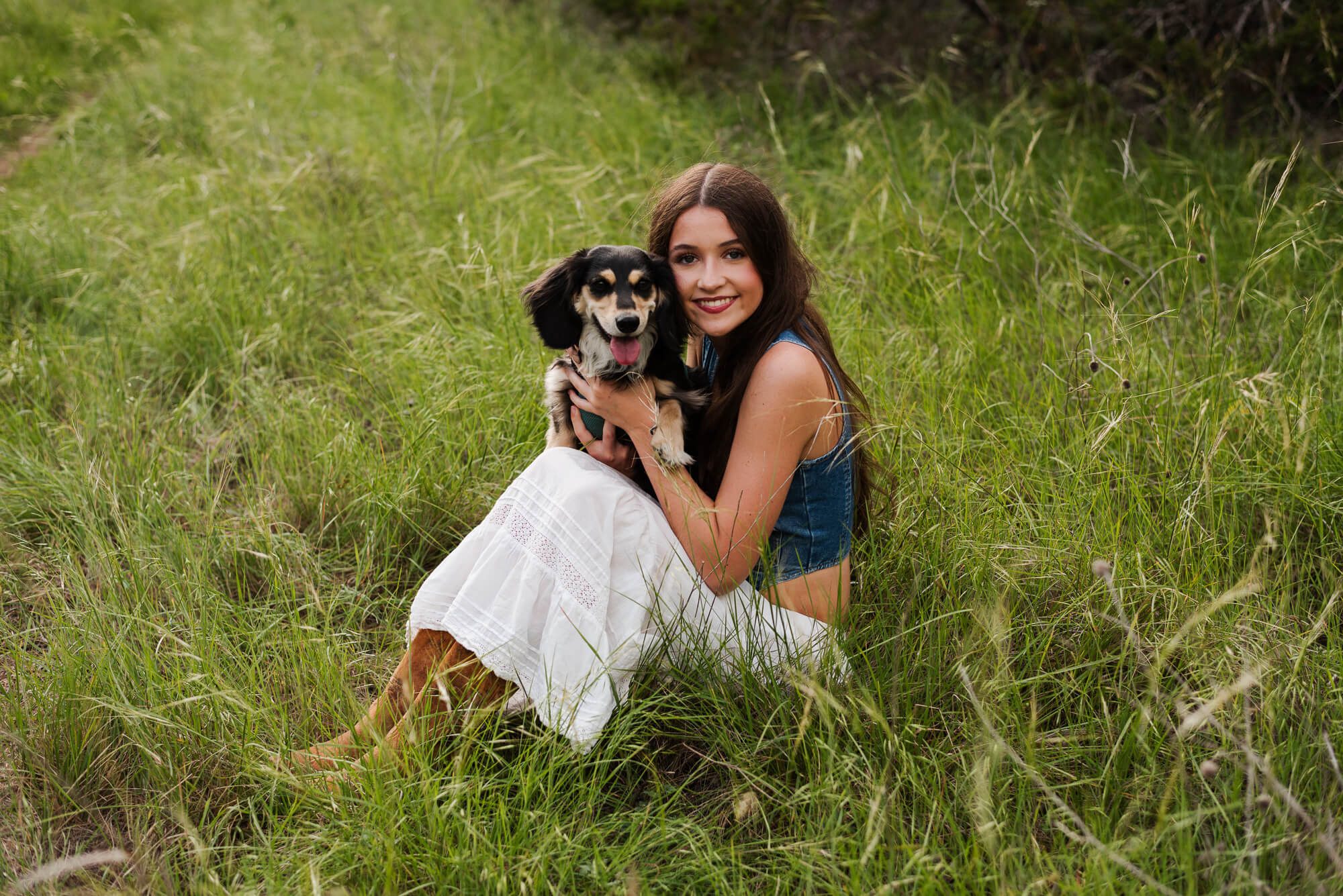 girl with her dog for senior photos