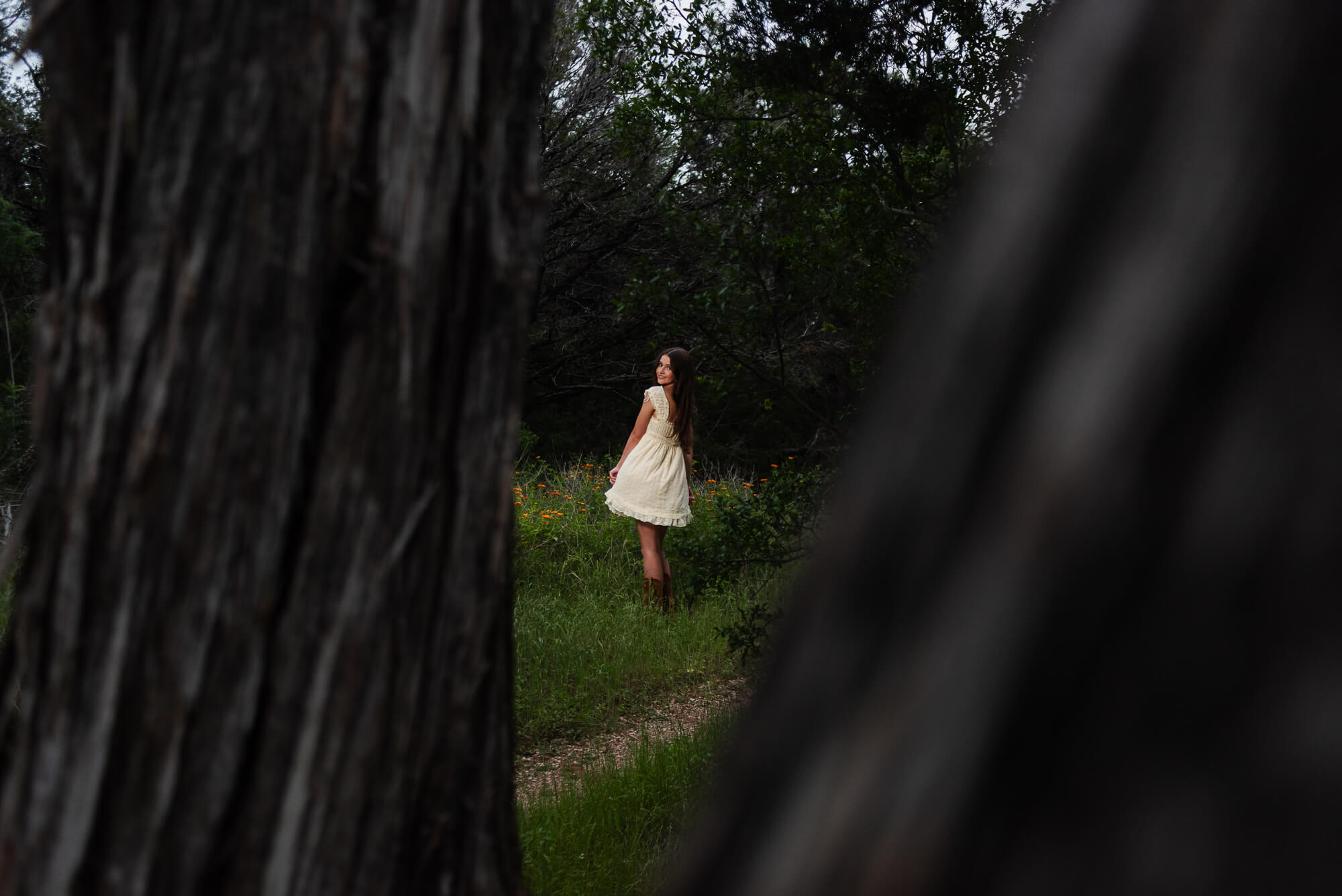 girl twirling for senior photos in austin texas