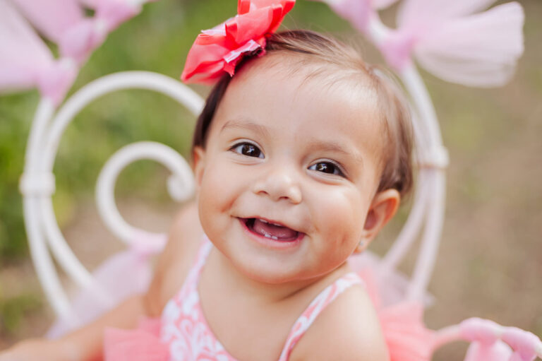 Whimsical First Birthday Photos with a Balloon Basket in Austin