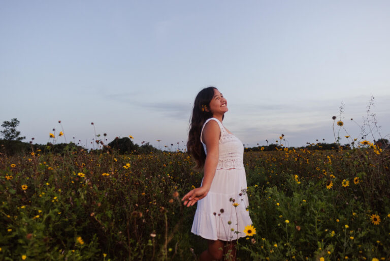 Blue Hour Senior Photos with Lanterns in a Wildflower Field