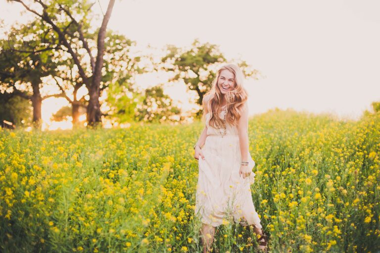 Spring Senior Session in a Field of Yellow Flowers