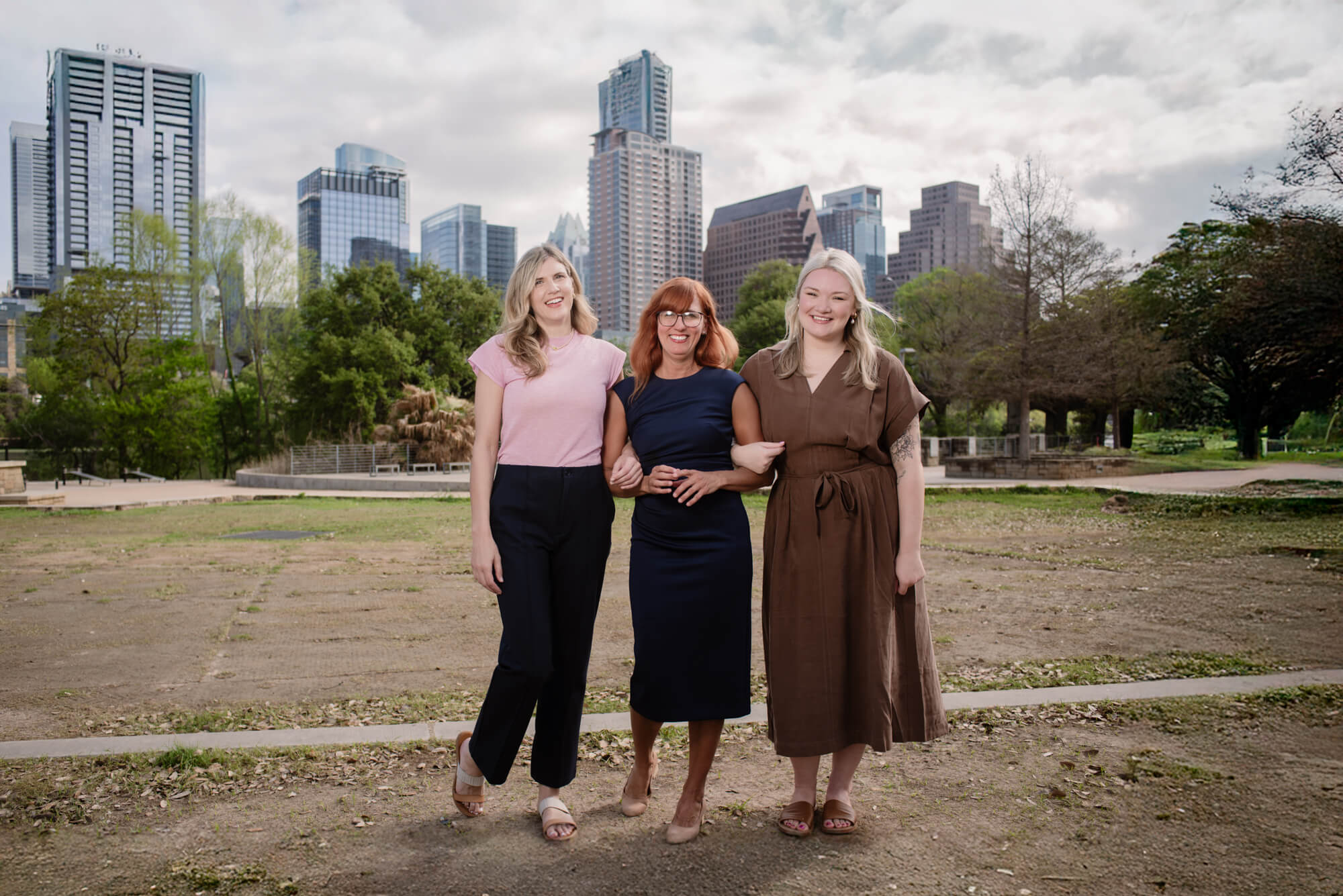 Therapists from Vida Clinic with downtown Austin Skyline in the background