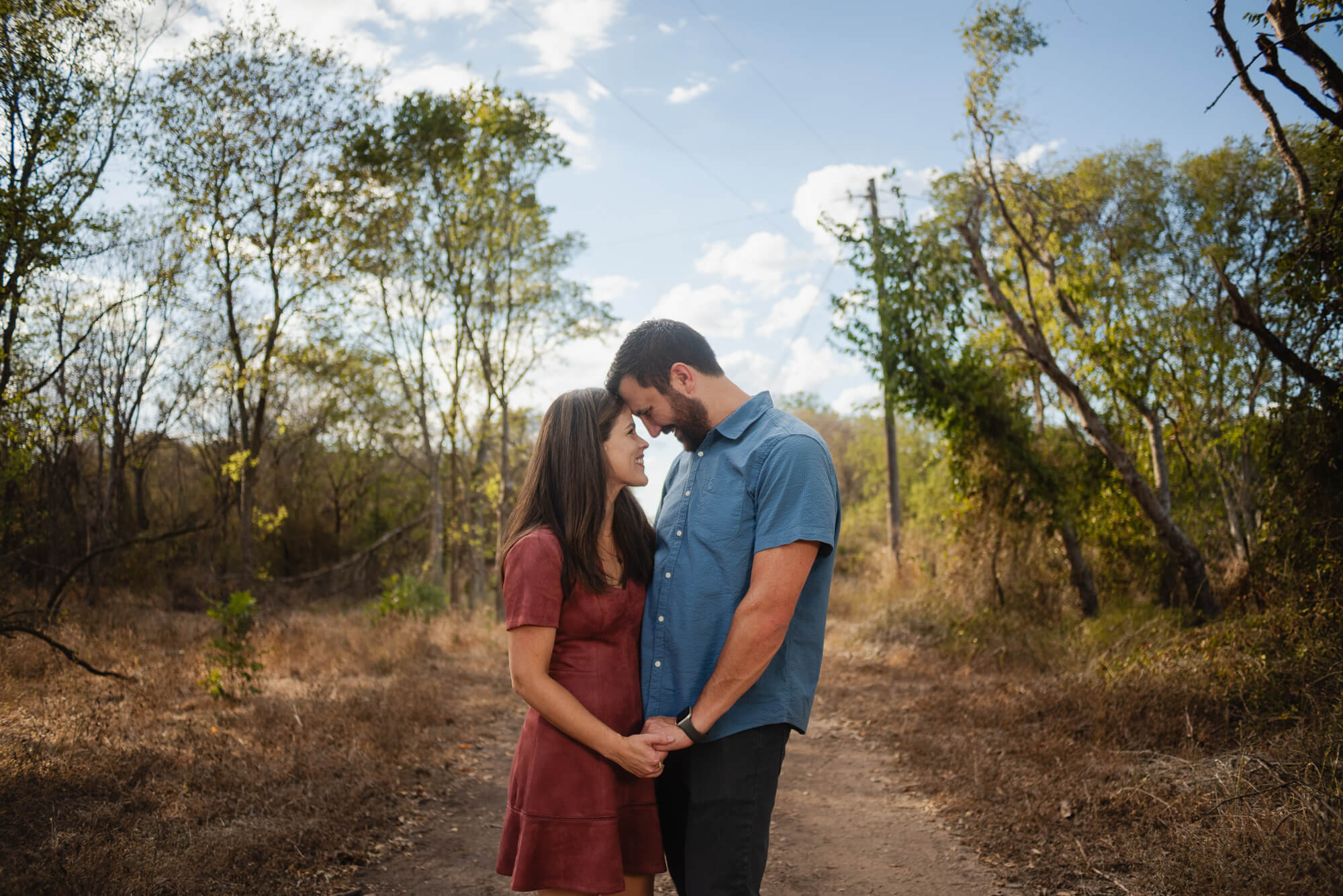 Parents sharing a quiet moment during a family photography session