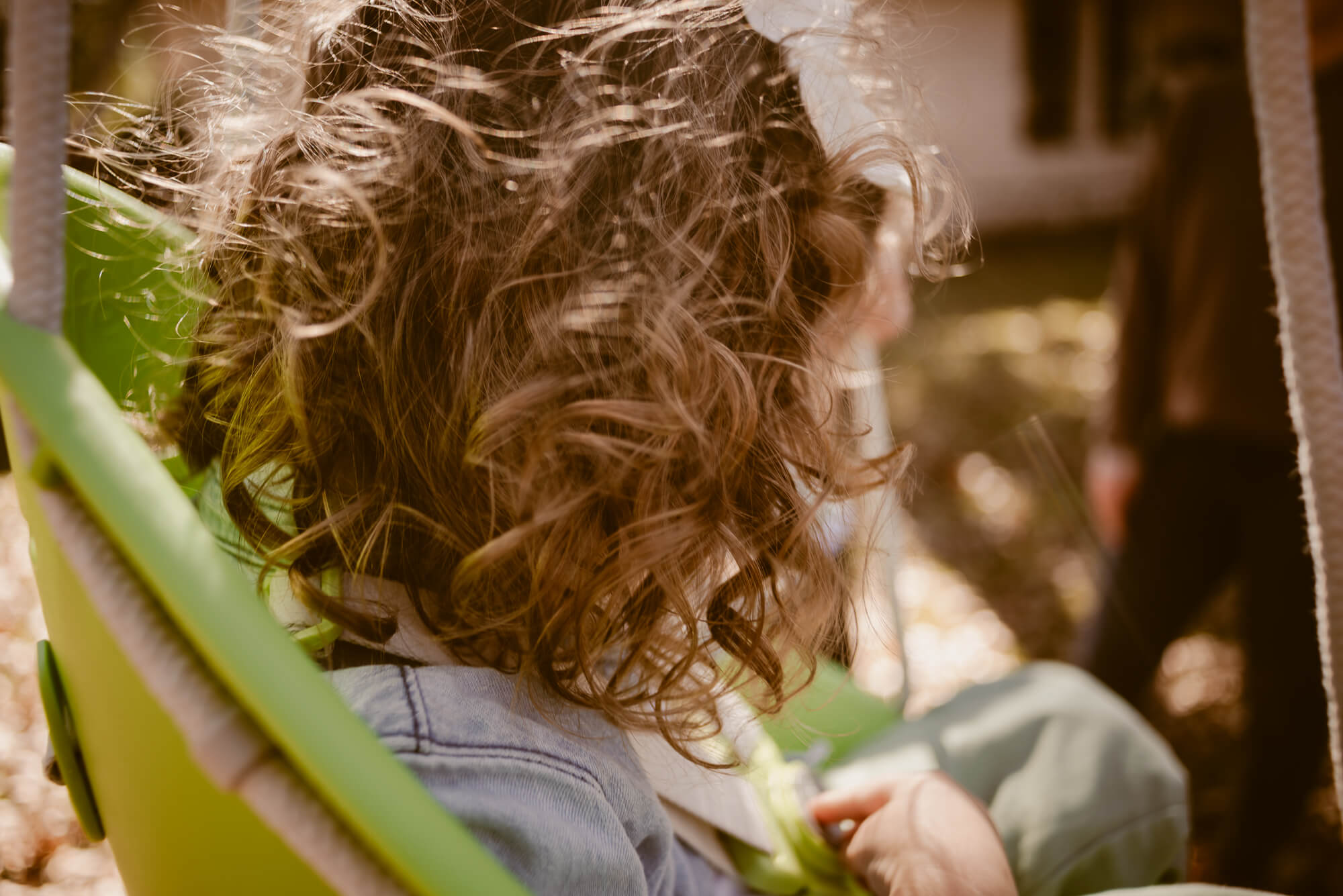 toddler's curly hair close up during an at home family photoshoot in austin texas