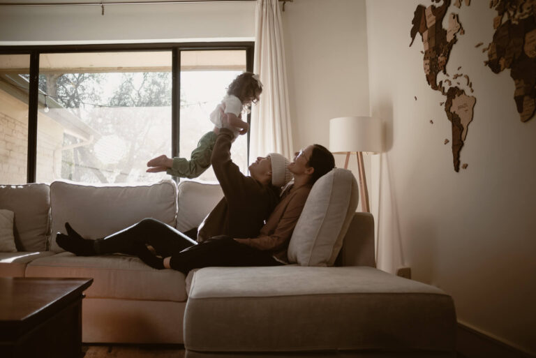 Valesquez family portrait in their living room during an in-home Christmas session in Austin